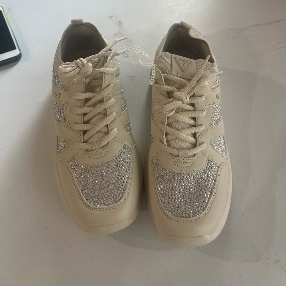 Guess Women's Beige and Silver Sneakers
Like new